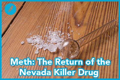 Meth and meth pipe on wooden background
